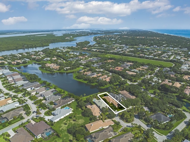 drone / aerial view with a water view