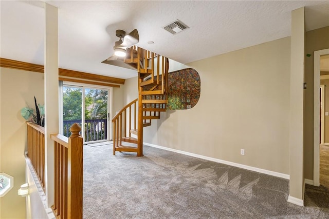 420 Sopwith Dr, Vero Beach, FL 32968 - stairway featuring carpet, baseboards, and a ceiling fan