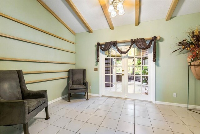 420 Sopwith Dr, Vero Beach, FL 32968 - sitting room featuring a chandelier, french doors, and baseboards