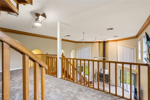 420 Sopwith Dr, Vero Beach, FL 32968 - hall with carpet floors, plenty of natural light, ornamental molding, and a high ceiling