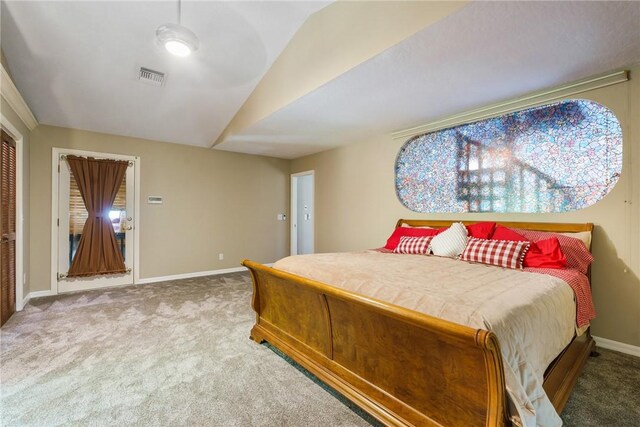 420 Sopwith Dr, Vero Beach, FL 32968 - carpeted bedroom featuring lofted ceiling and baseboards