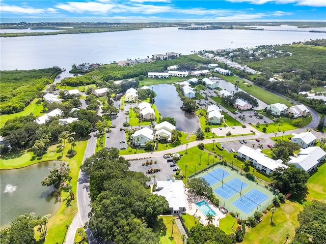 bird's eye view with a water view