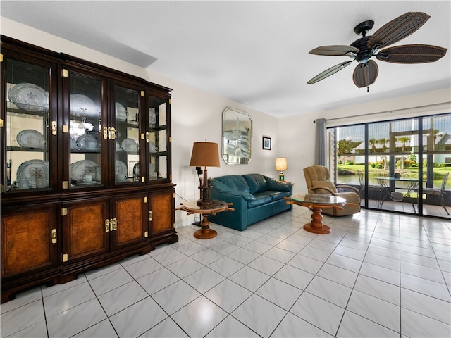 interior space with ceiling fan