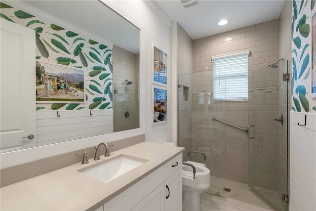 bathroom with toilet, vanity, crown molding, and an enclosed shower