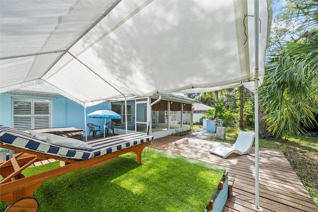 rear view of house featuring a lawn and a patio area