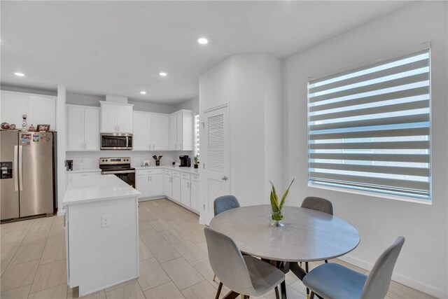 102 52nd Sq, Vero Beach, FL 32967 - dining room with recessed lighting