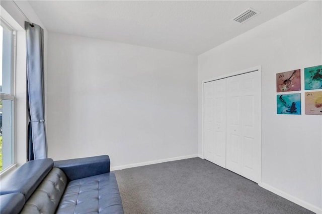 102 52nd Sq, Vero Beach, FL 32967 - unfurnished room featuring carpet flooring, baseboards, and visible vents