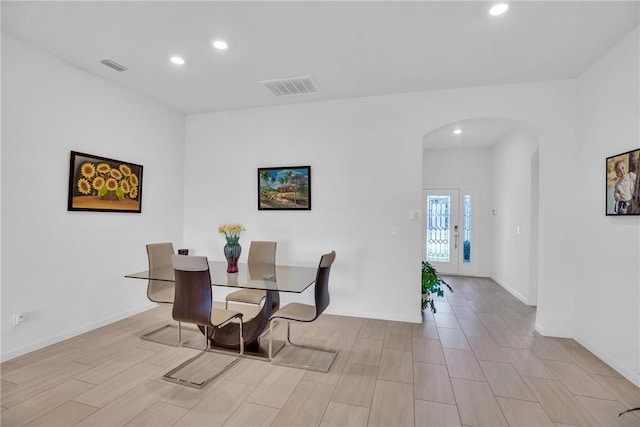 102 52nd Sq, Vero Beach, FL 32967 - dining space with recessed lighting, arched walkways, and visible vents