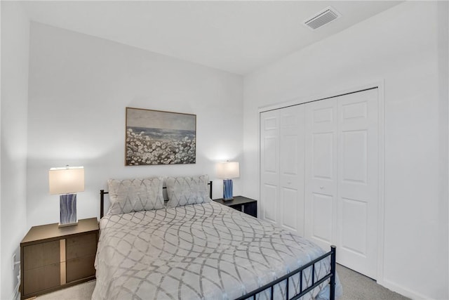 102 52nd Sq, Vero Beach, FL 32967 - carpeted bedroom with a closet and visible vents