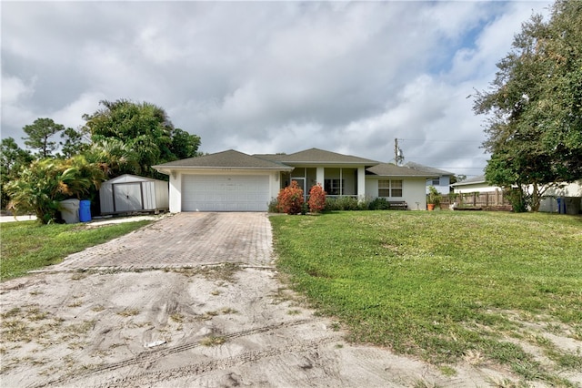 single story home with a front lawn and a storage shed