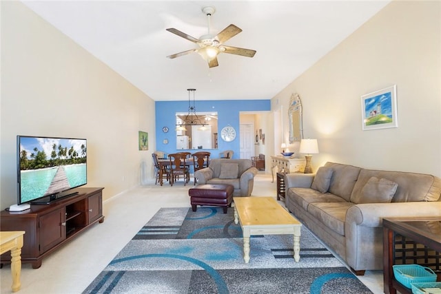 living room featuring ceiling fan and light carpet