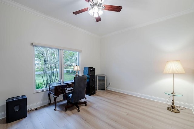 home office featuring ceiling fan, ornamental molding, beverage cooler, and light wood-type flooring