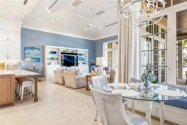 dining room with ceiling fan, a towering ceiling, and wood ceiling