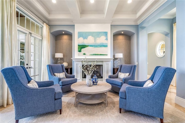 living room with beamed ceiling, french doors, plenty of natural light, and coffered ceiling