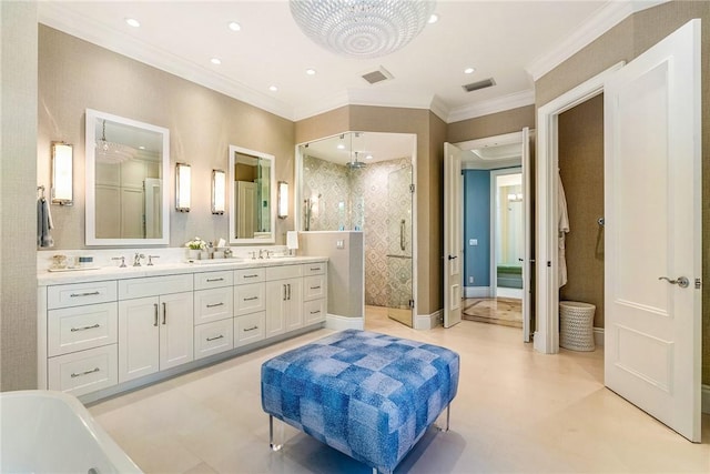 bathroom with a chandelier, vanity, separate shower and tub, and ornamental molding