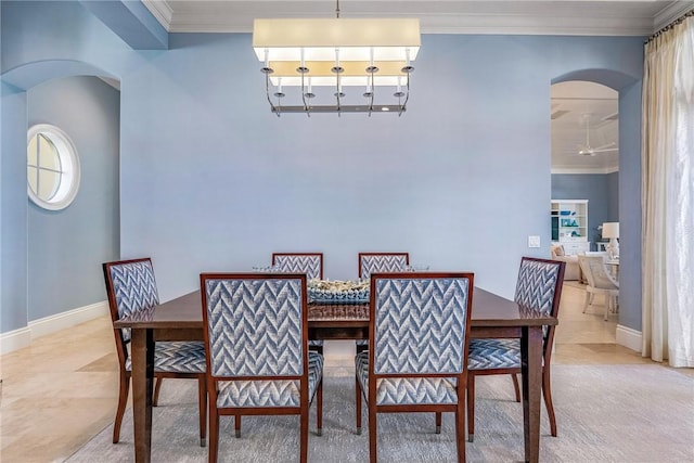 carpeted dining area with crown molding