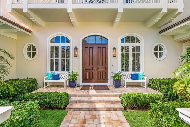 view of pool with a patio area and a water view