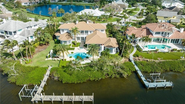 drone / aerial view with a water view