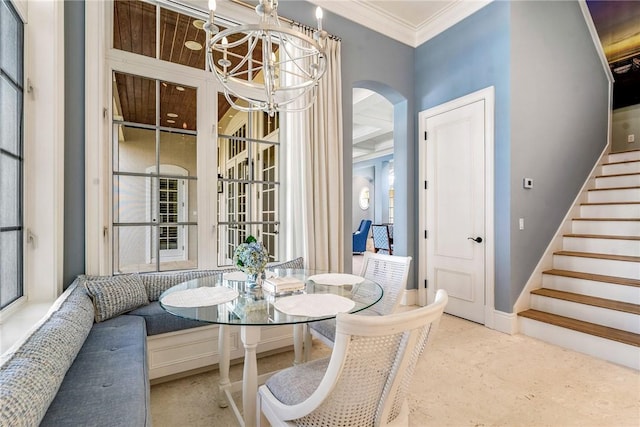 dining space featuring ornamental molding