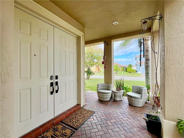 foyer with dark hardwood / wood-style floors