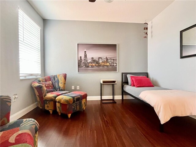 bedroom featuring dark hardwood / wood-style floors and ceiling fan