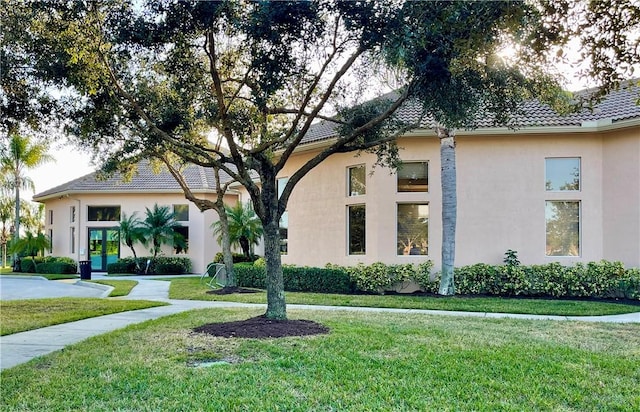 exterior space with a front lawn