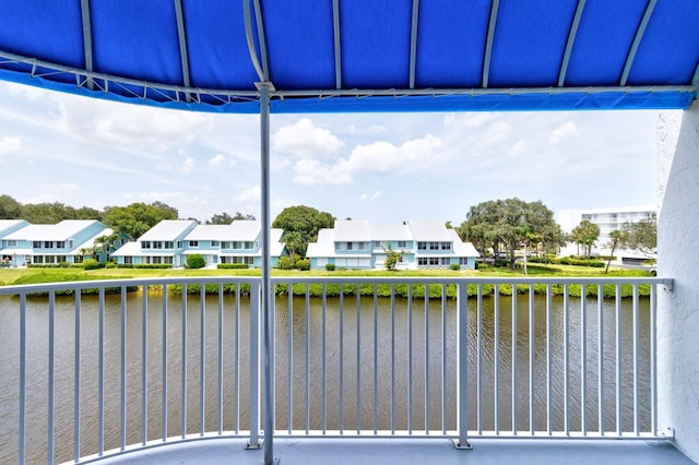 view of patio featuring a water view