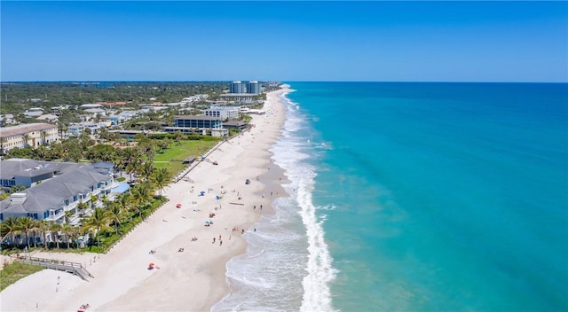 aerial view featuring a beach view and a water view