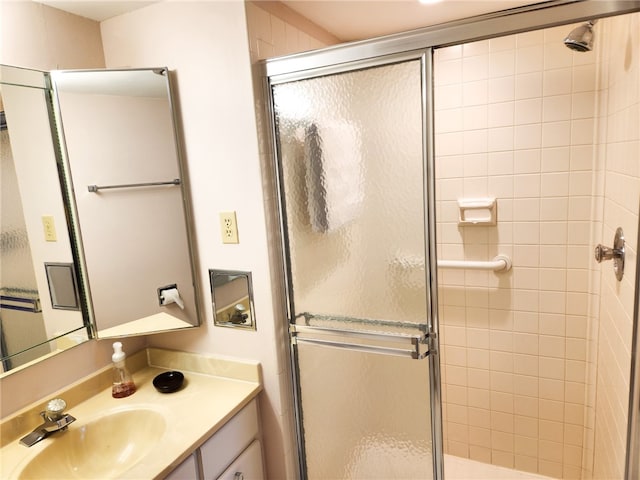 bathroom featuring vanity and walk in shower