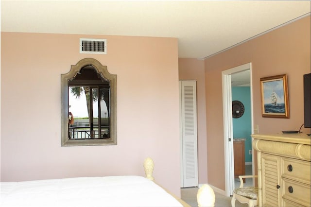 3939 Ocean Dr Unit 205C, Vero Beach, FL 32963 - bedroom with baseboards and a closet