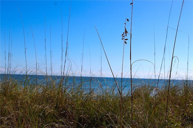 3939 Ocean Dr Unit 205C, Vero Beach, FL 32963 - mountain view featuring a nearby body of water