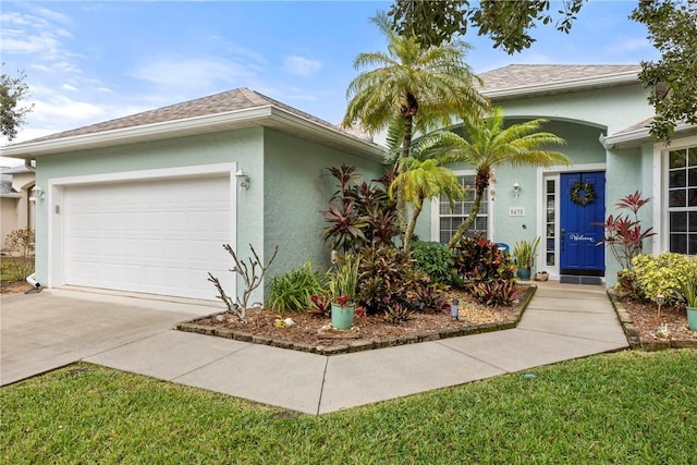 single story home featuring a garage