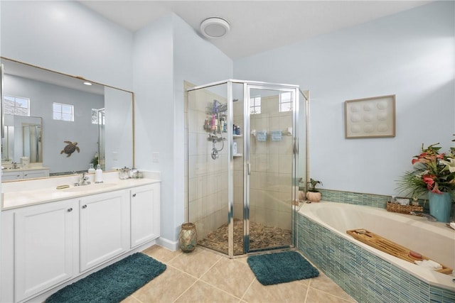 bathroom with separate shower and tub, vanity, and tile patterned flooring