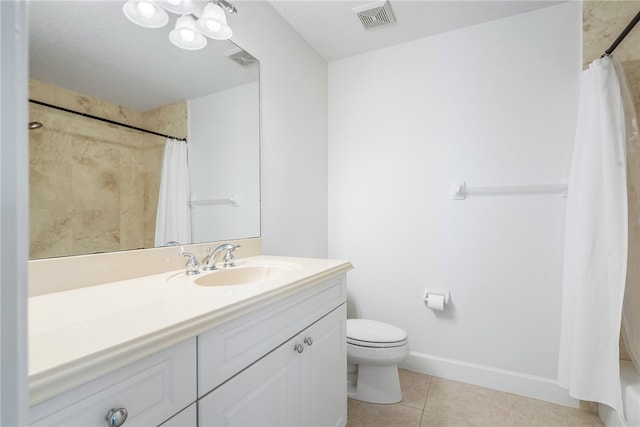 bathroom with vanity, curtained shower, tile patterned flooring, and toilet