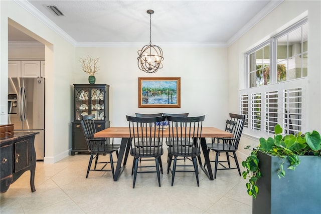 tiled dining space with a chandelier and ornamental molding