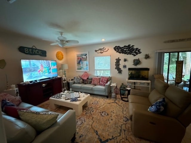 living room featuring ceiling fan