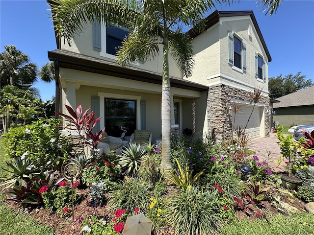 view of front of property with a garage