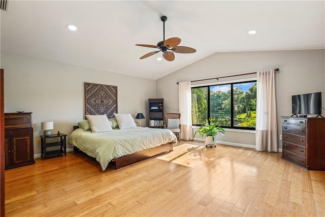 240 44th Ter SW, Vero Beach, FL 32968 - bedroom with vaulted ceiling, light wood finished floors, a ceiling fan, recessed lighting, and baseboards