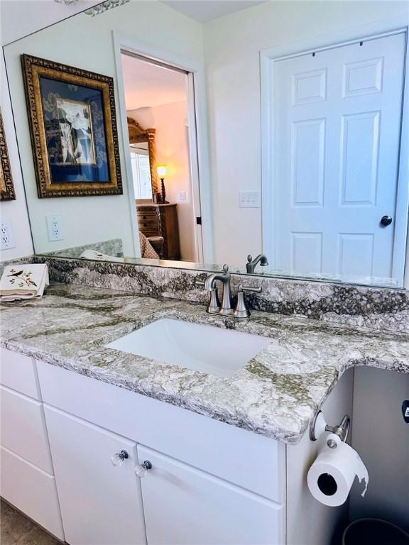 600 E Lake Jasmine Cir Unit 206, Vero Beach, FL 32962 - bathroom featuring vanity