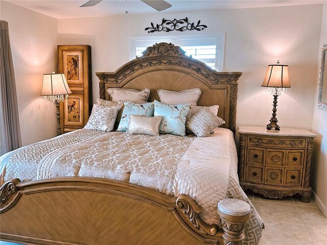 600 E Lake Jasmine Cir Unit 206, Vero Beach, FL 32962 - tiled bedroom with a ceiling fan