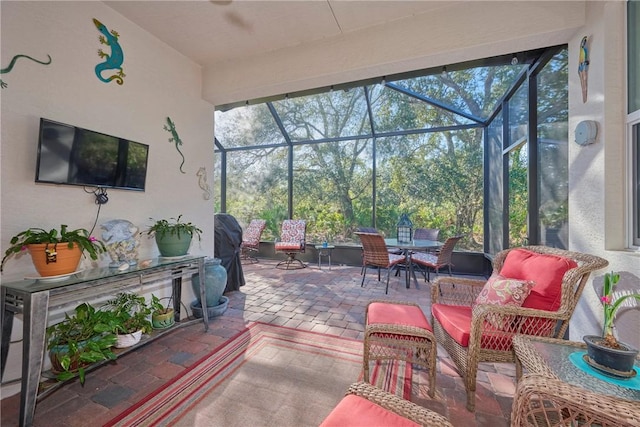 sunroom with plenty of natural light