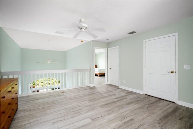 interior space featuring light wood-type flooring and ceiling fan