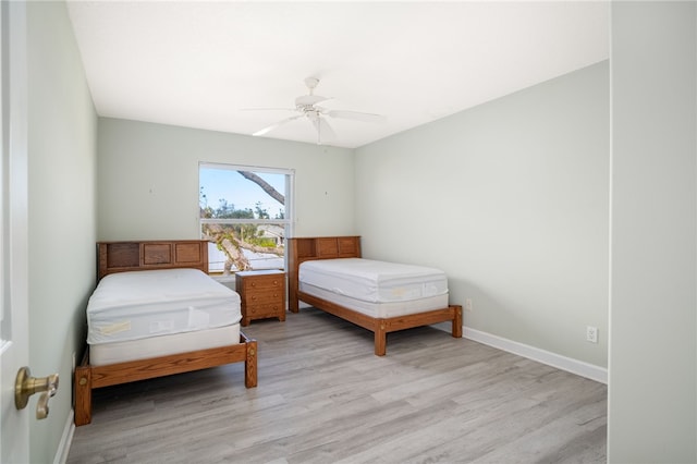 bedroom featuring ceiling fan and light wood-type flooring