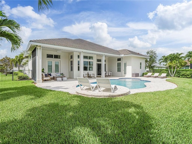4520 Jacqueline Mnr, Vero Beach, FL 32968 - rear view of house featuring stucco siding, french doors, and a patio