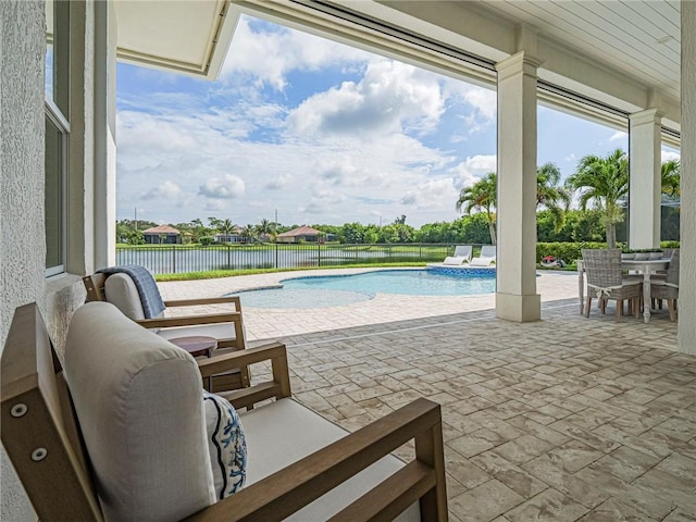 4520 Jacqueline Mnr, Vero Beach, FL 32968 - view of pool with a patio, a fenced backyard, and a water view