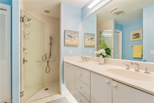 1510 Oak Harbor Blvd Unit 102, Vero Beach, FL 32967 - full bathroom featuring a shower stall, double vanity, and a closet