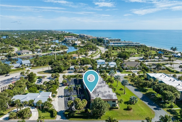 drone / aerial view with a water view