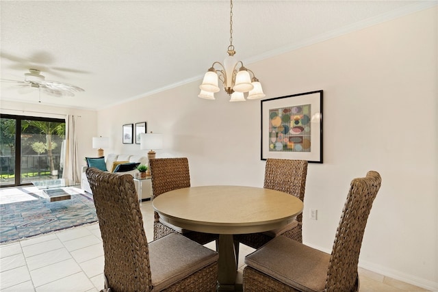 dining room featuring ceiling fan with notable chandelier, light tile patterned floors, and crown molding