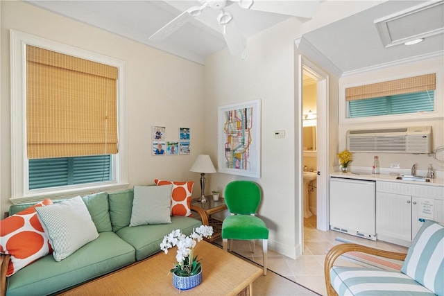 tiled living room with a wall unit AC and sink