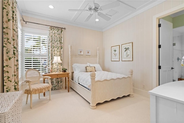 bedroom with carpet flooring, ceiling fan, coffered ceiling, and ornamental molding